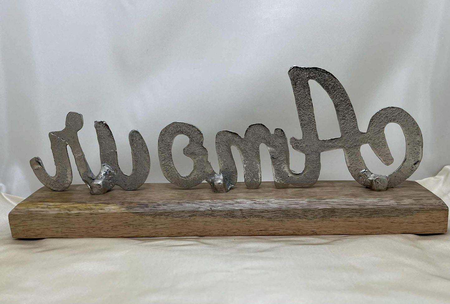 "Amour" en aluminium coulé sur socle de bois Gmbh (28*11cm)