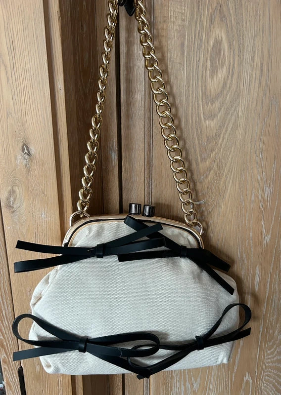 Sac en toile de jute avec nœuds noirs fermeture mécanique