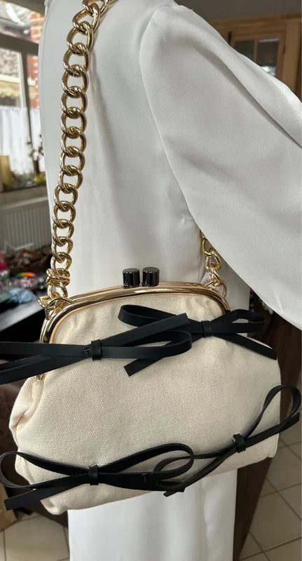 Sac en toile de jute avec nœuds noirs fermeture mécanique