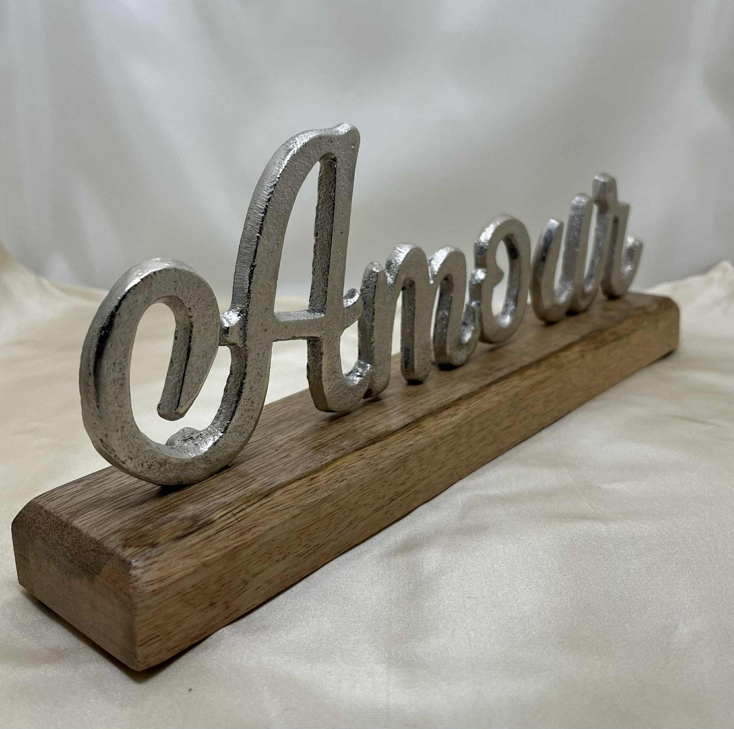 "Amour" en aluminium coulé sur socle de bois Gmbh (28*11cm)