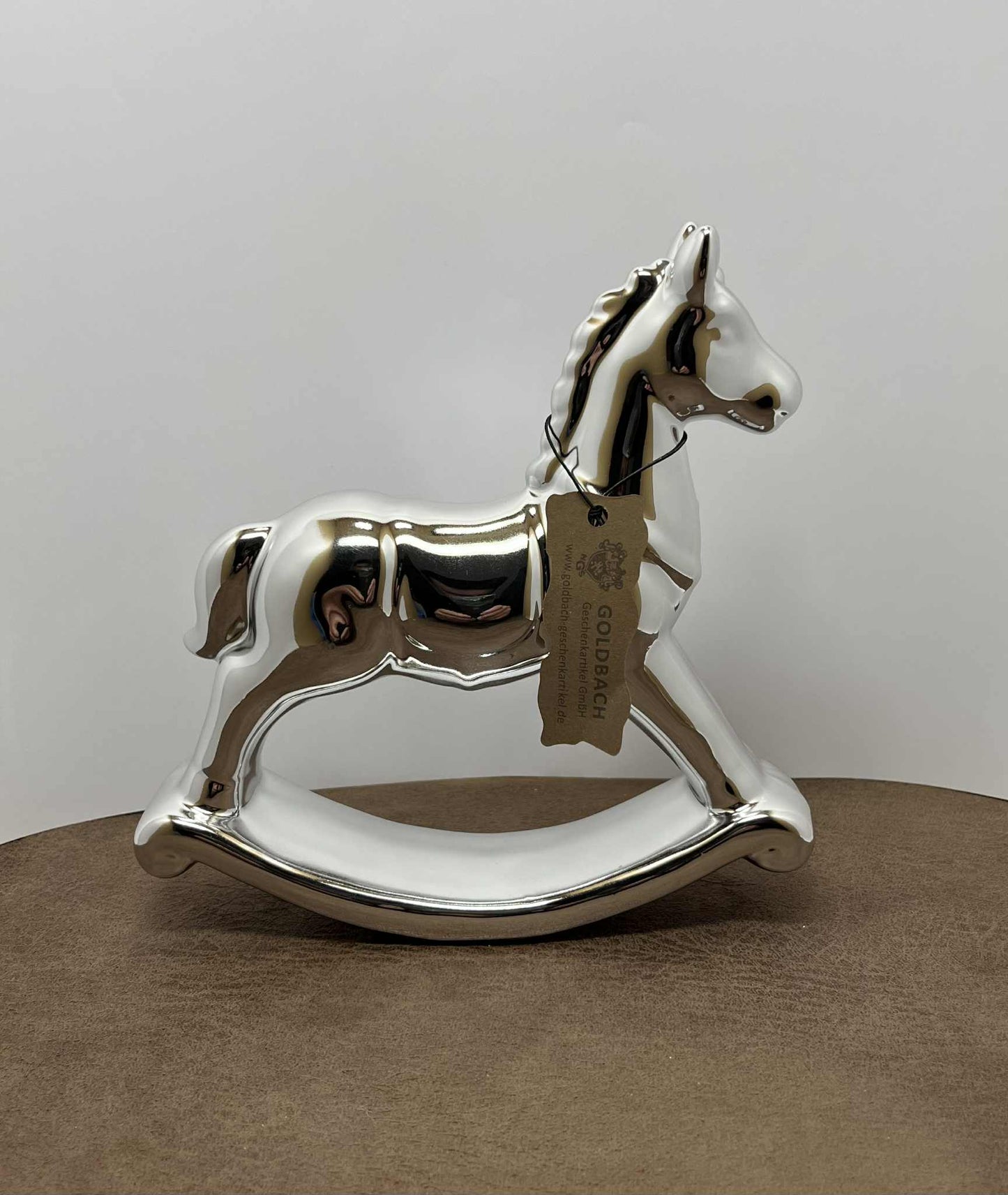 Cheval à bascule en plâtre recouvert de peinture argentée fait main  de GmbH (17*15.5)
