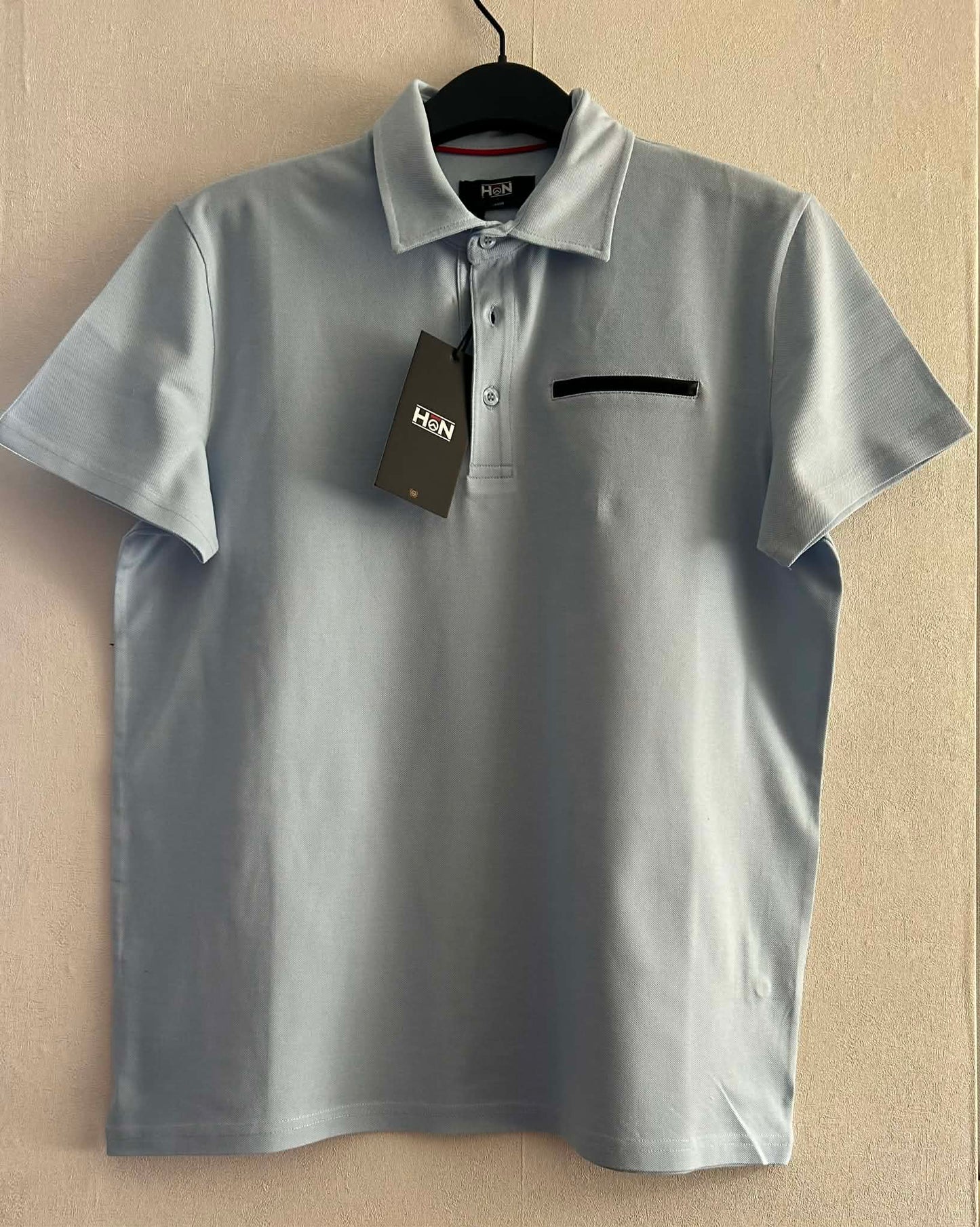 Polo bleu ciel 95% coton 5% élasthanne HON