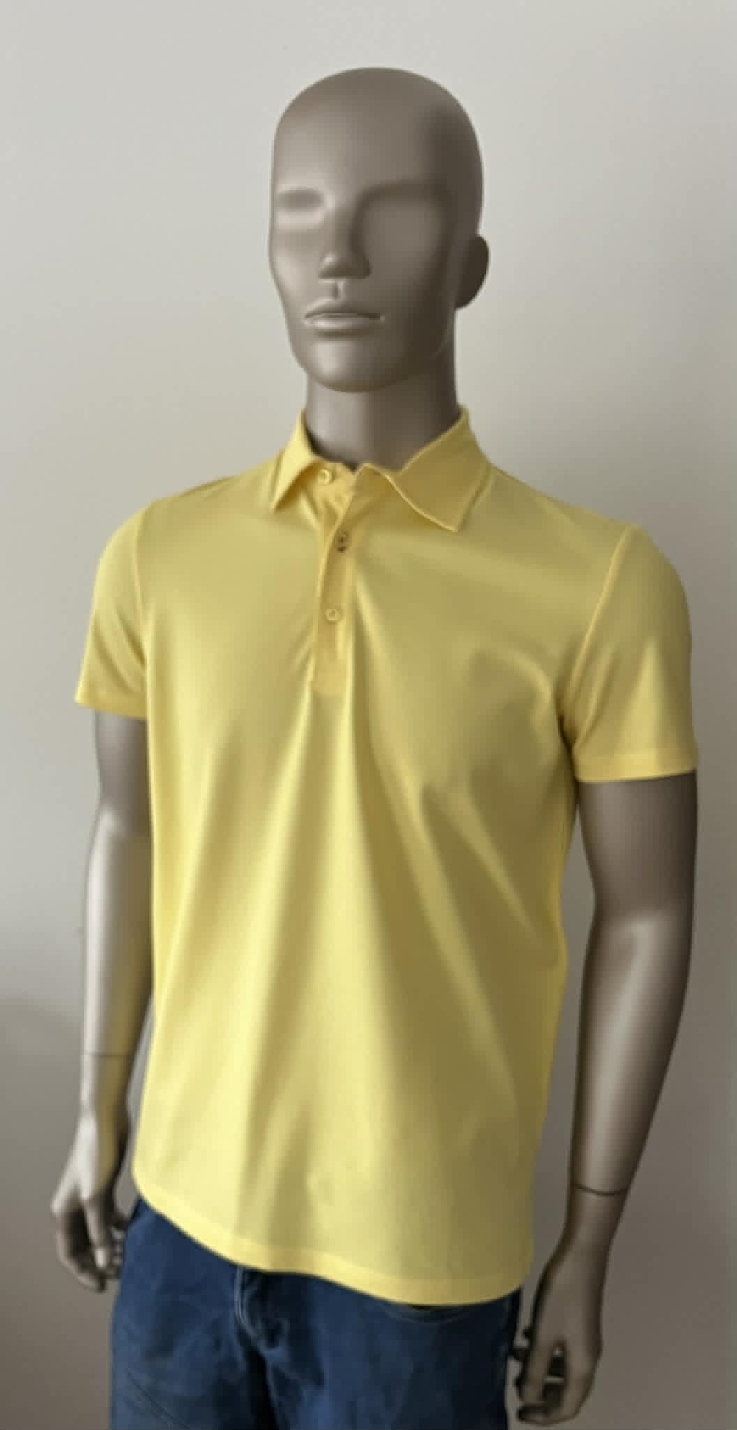 Polo jaune boutonnières rouges Hon