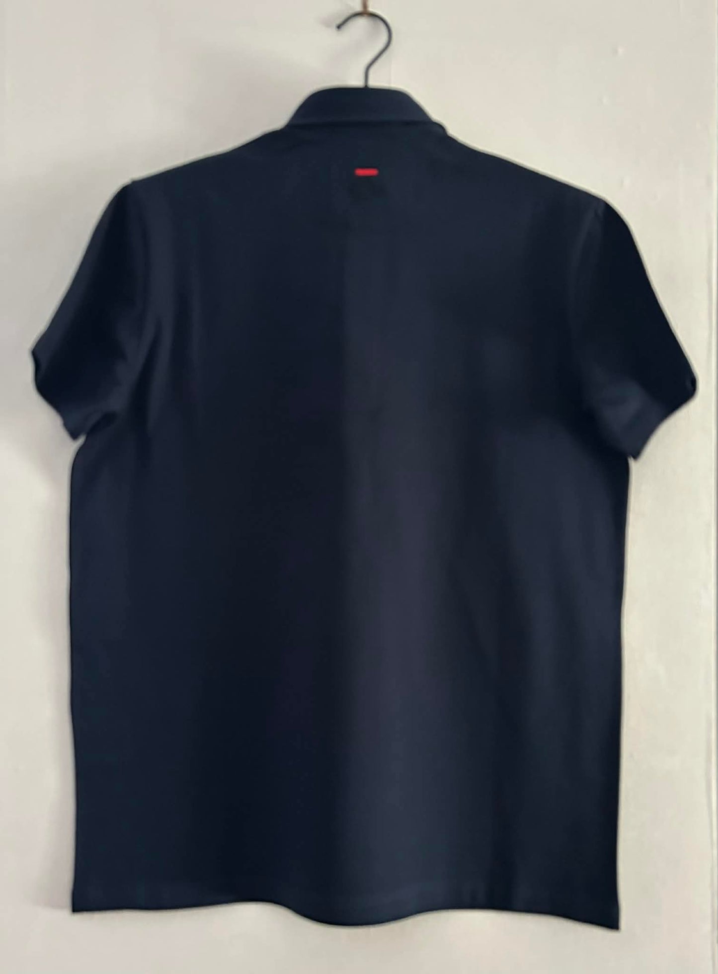 Polo marine  95 % coton 5% élasthanne de Hon