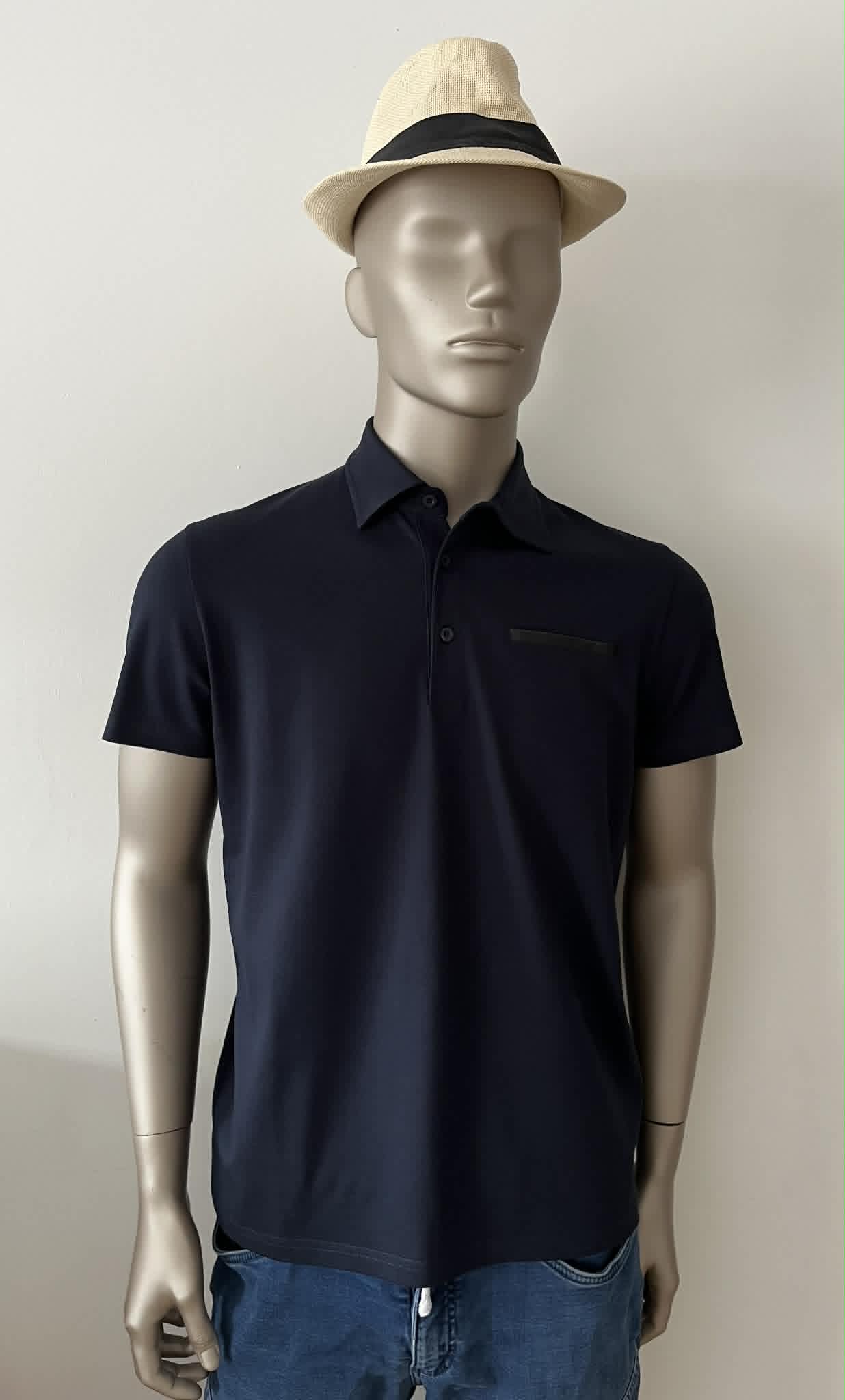 Polo marine  95 % coton 5% élasthanne de Hon