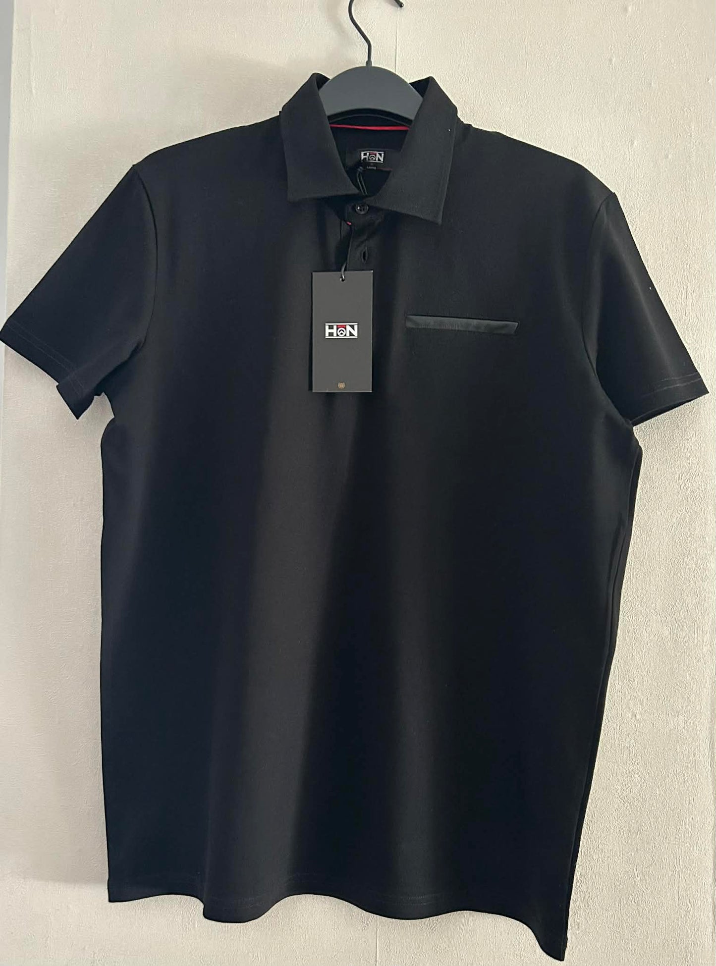 Polo noir 95% coton 5 % élasthanne HON